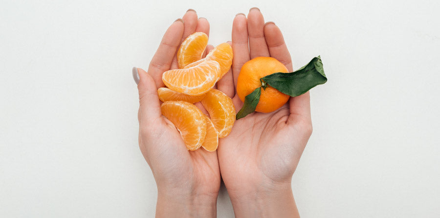 Tangerines in Hands