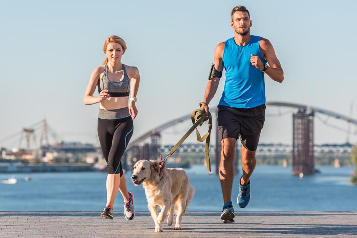Running with Golden Retriever dog