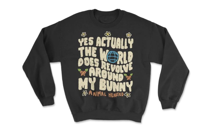 Black sweatshirt with "The world revolves around my bunny" print
