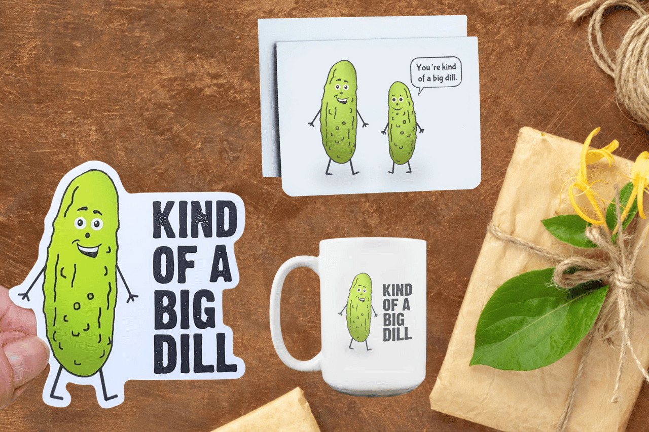A photo of a sticker, card and mug. They have a cartoon pickle on them. Text reads, Kind of a Big Dill.