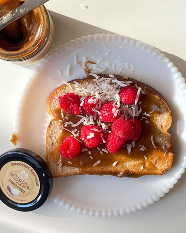 Raspberries with coconut spread topped with shredded coconut. Coco Jam Filipino Coconut Jam