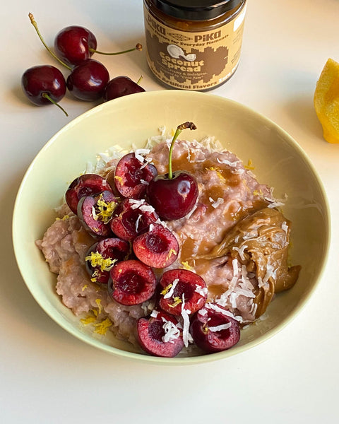 Pink oatmeal with cherry and coconuts using Pika Pika's Coconut Spread