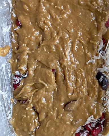 Layered batter. split batter in half, lay first half in loaf pan, then top with cherries then lay second half of batter