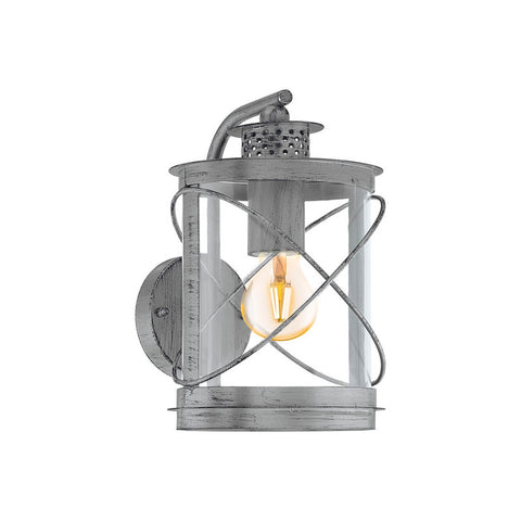 A silver nautical light shaped like a lantern.