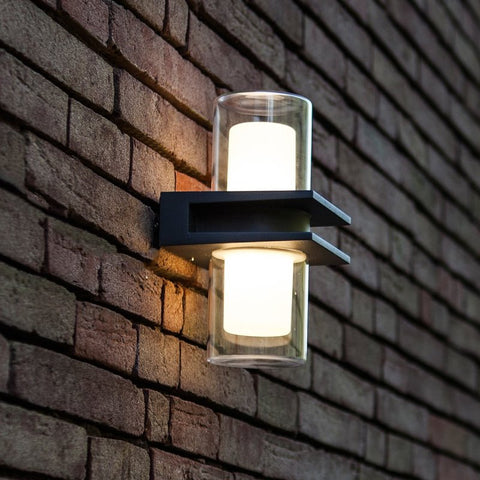 A modern outdoor wall light mounted on an exterior wall.