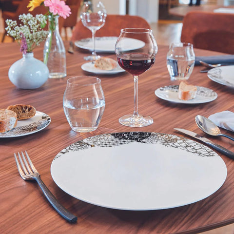 Restaurant cutlery and plate ware with wine glasses