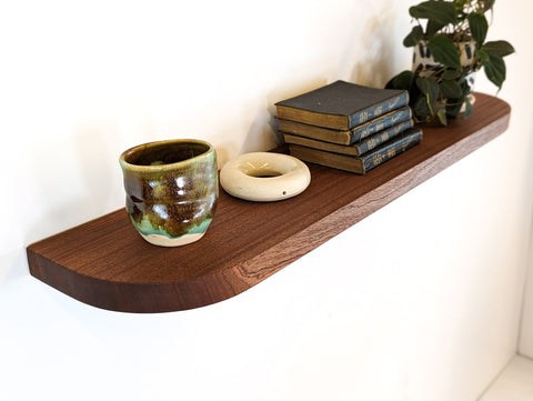 A large mahogany floating shelf