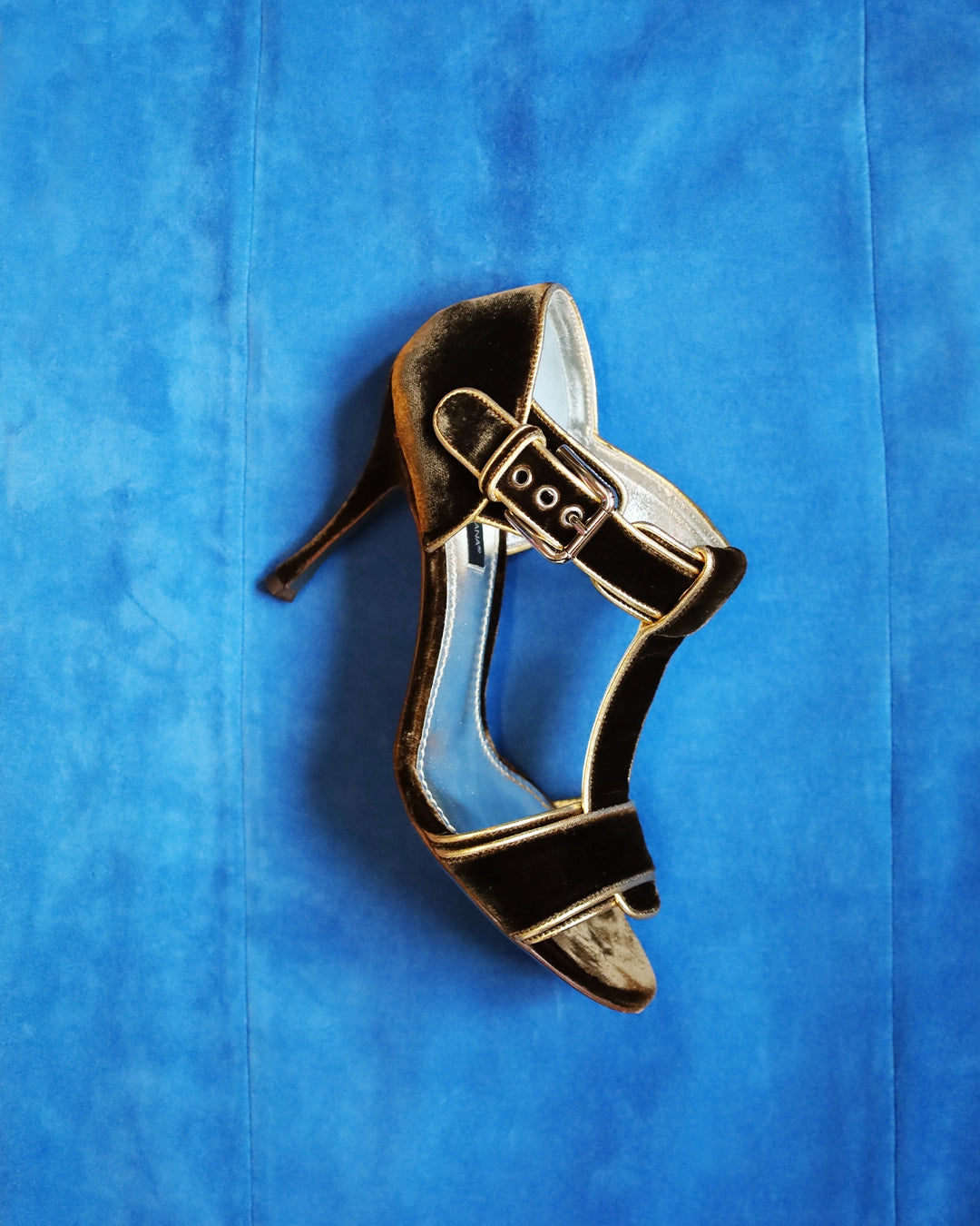 Close-up of vintage leather heels with aged patina, showcasing archival craftsmanship and iconic retro design from Milan vintage fashion.