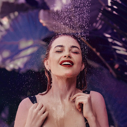 woman enjoying a shower