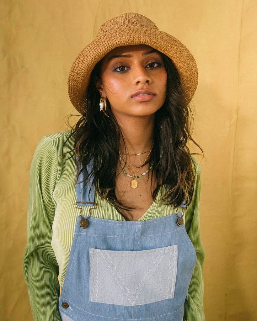 Double Denim Dungaree outfit with straw hat and bell sleeves