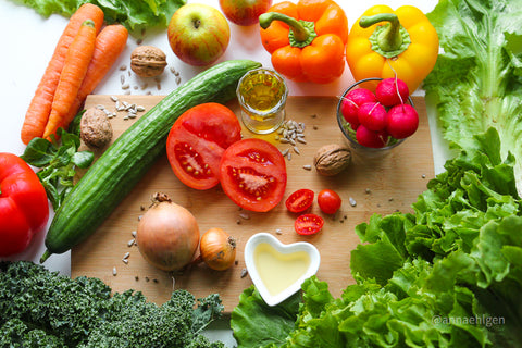 Lettuce and suitable ingredients such as fresh tomatoes show regional and seasonal foods for children's nutrition