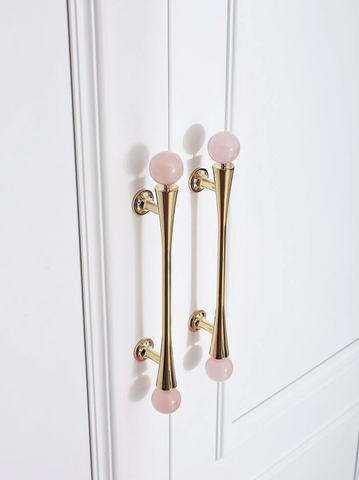 polished brass and stone cabinet handles