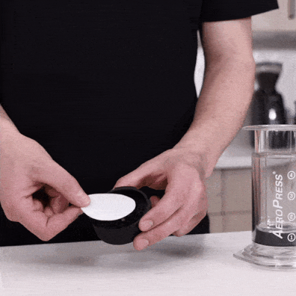 Demo gif showing how to use the AeroPress Flow Control Filter Cap