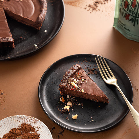 An indulgent slice of vegan chocolate cheesecake.