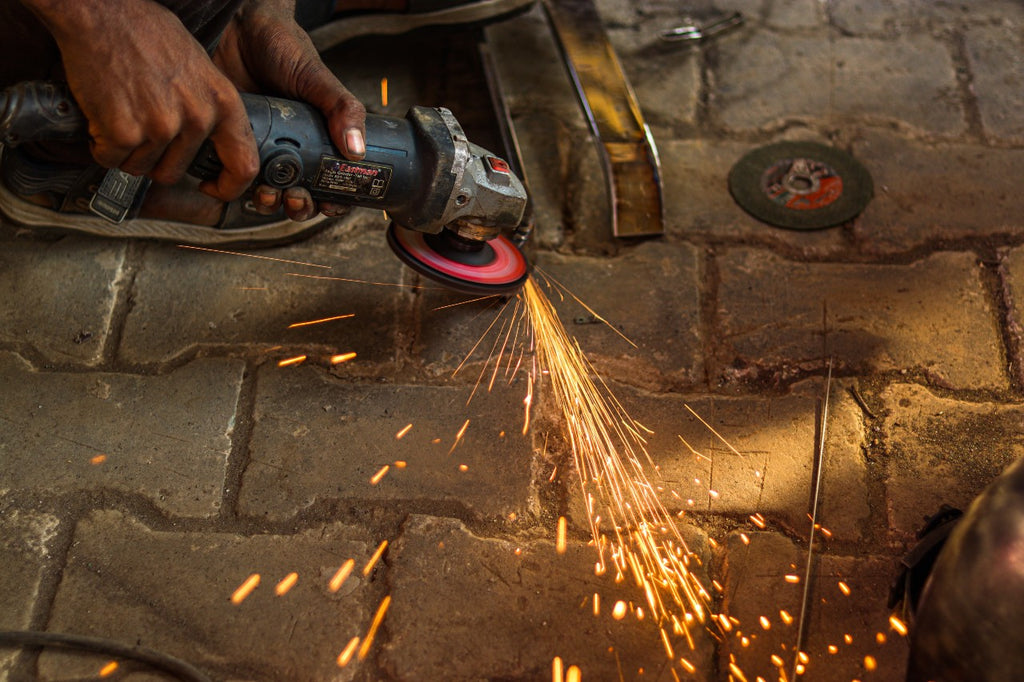 angle grinder cutting with sparks