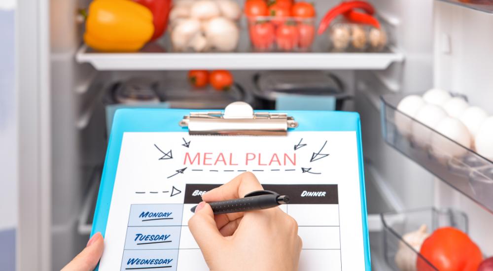 Person creating a healthy meal plan