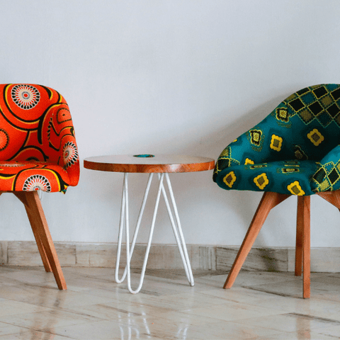 mismatched chairs of different materials