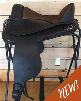 Freeform Pathfinder Treeless Saddle on a saddle rack.