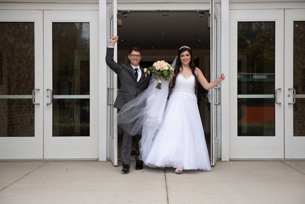 The couple had postponed their wedding celebrations twice due to the pandemic, but elected to get married with an intimate ceremony followed by a backyard reception in October 2020.