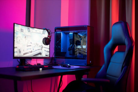 Gaming setup with rgd red and purple lights