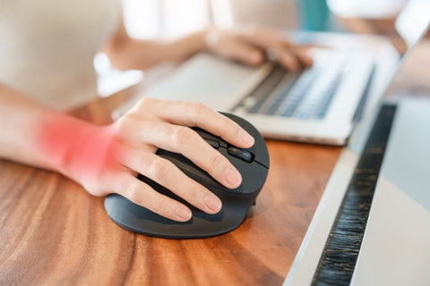 photo of womans hand on ergonomic mouse