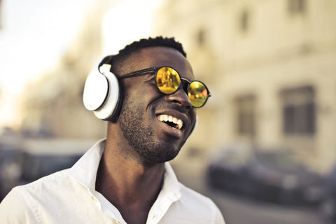 man wearing headphones with sunglasses