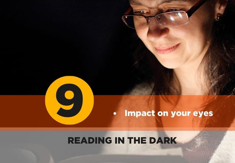 Woman reading her tablet in the darkness