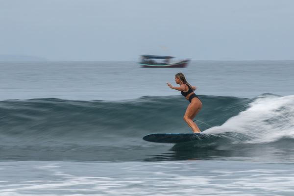 Emma surfing in Bali