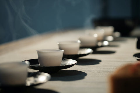 Row of tea cups