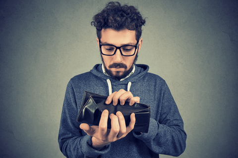 man checking wallet for valentines day gift ideas