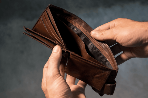 empty wallet to show budget for wedding gift