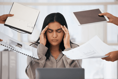 woman overwhelmed by burnout in schedule and deadlines