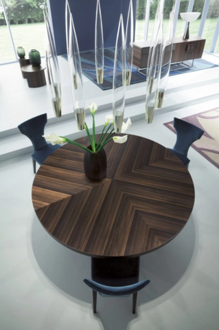 Circular wood dining table modus costantini pietro