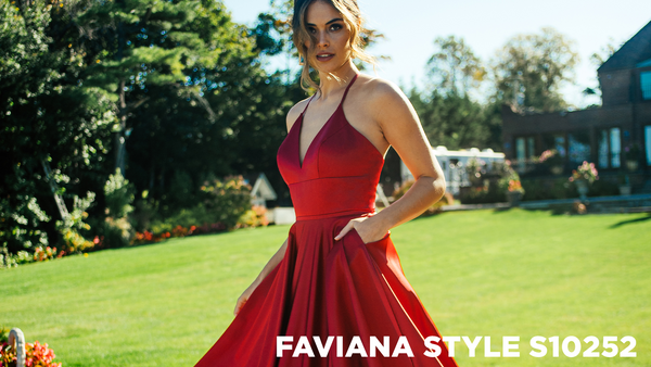 Faviana Style S10252 - Girl twirling in a red satin ballgown with pockets