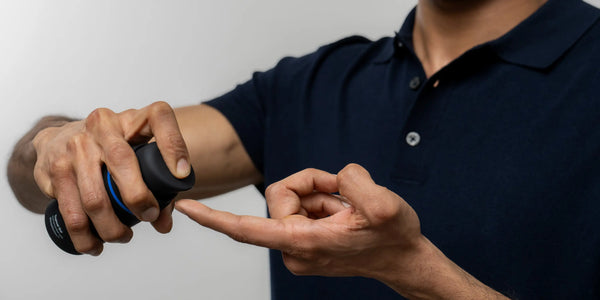 man pumping hair loss gel onto finger