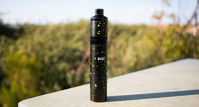 Wulf Evolve Plus XL Black with Green Spatter standing on platform