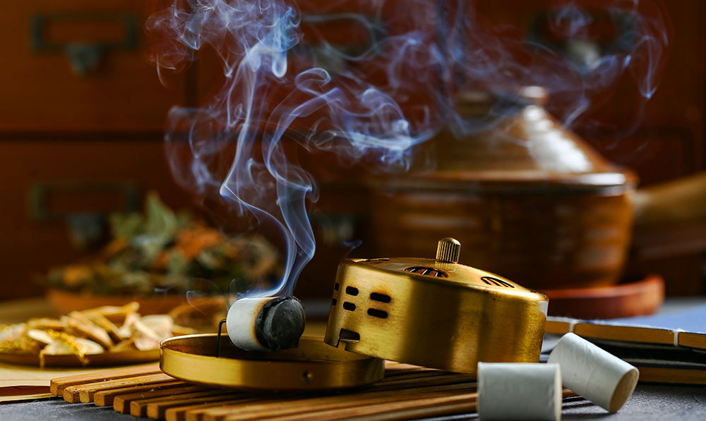 Chinese Moxibustion on top of table