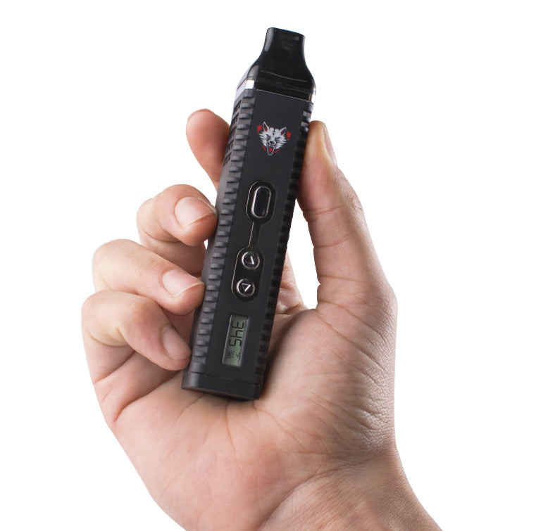 Hand holding the Wulf Digital Vaporizer on white background