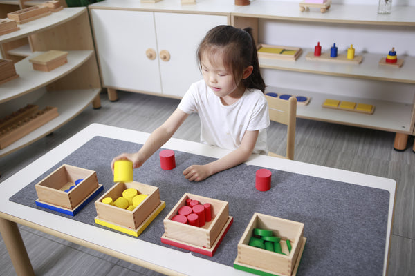 Young Girl Playing With Montessori Materials in Australia