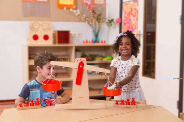 Children Playing With Educational Wooden Toy
