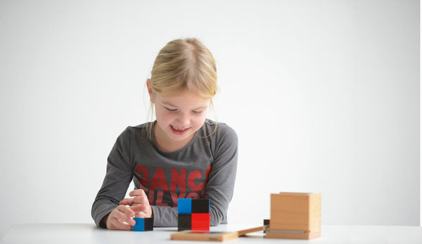 Child Learning With Montessori Materials