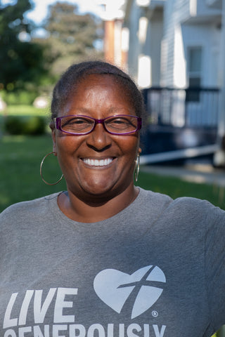 headshot of black woman smiling