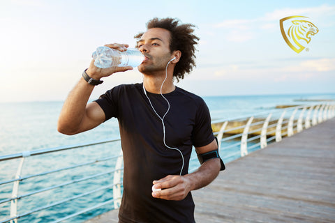 fit men drinking water Apex Nutrition