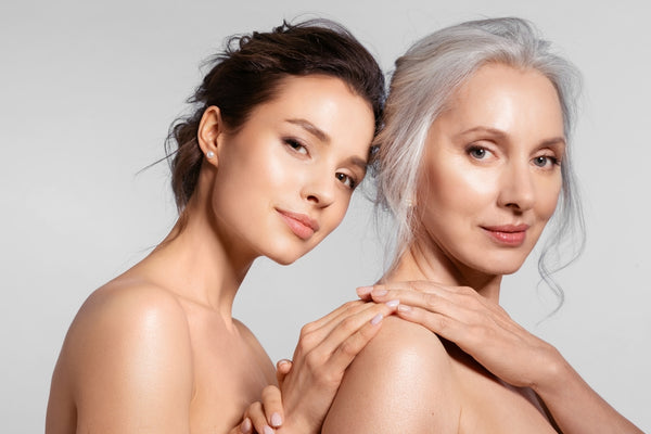 One young and one middle aged woman with great skin