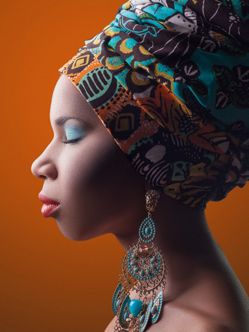 African Woman in Kente head wrap