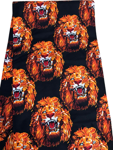 Isi-Agu fabric with lions over black backdrop