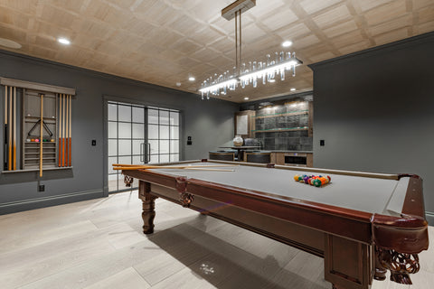 engineered hardwood flooring in a cozy den with a pool table