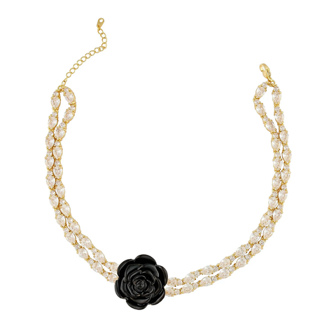The Kiss From A Rose Necklace from Hey Maeve with a black rose and gold chain.