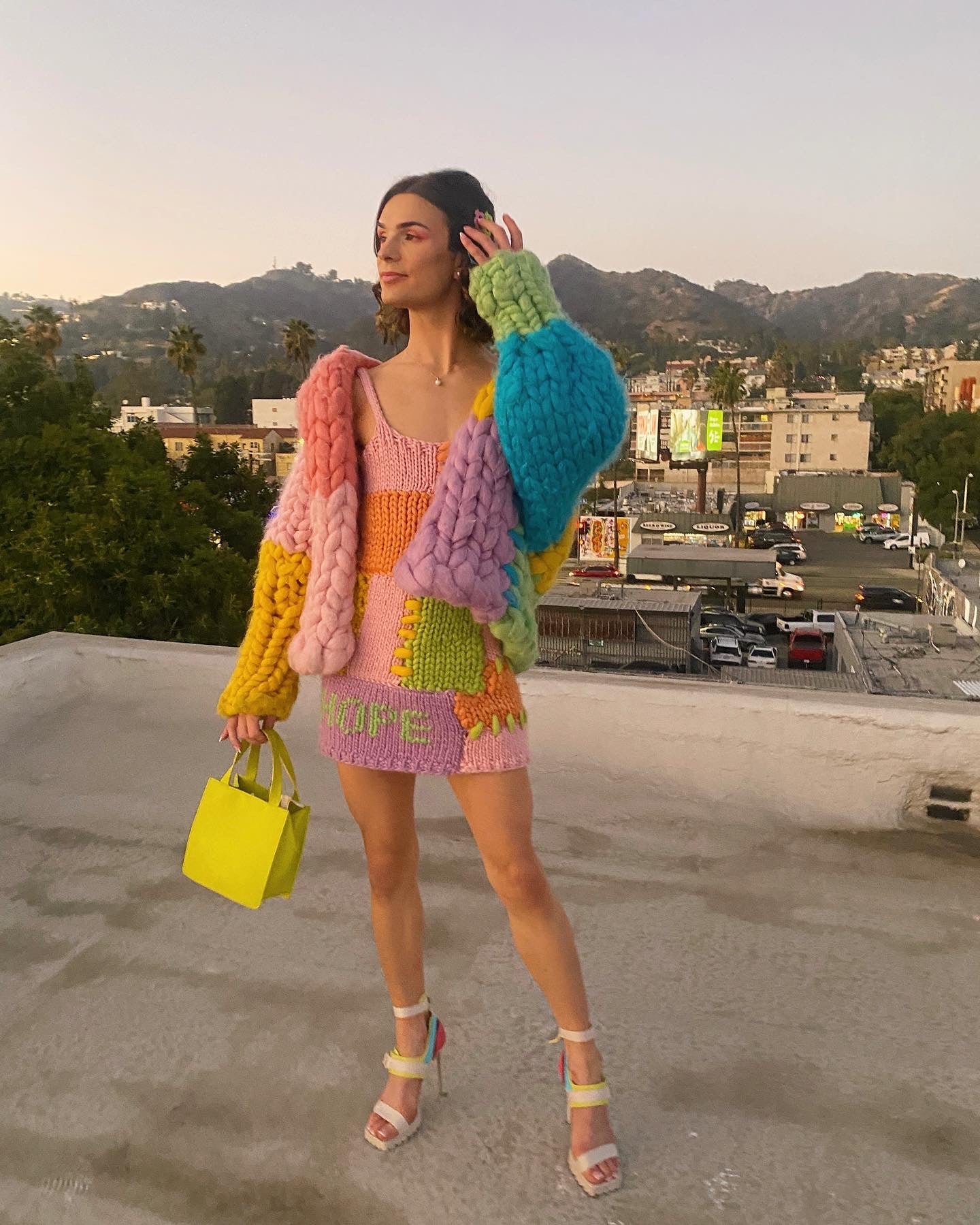 Dylan Mulvaney in a colorful dress
