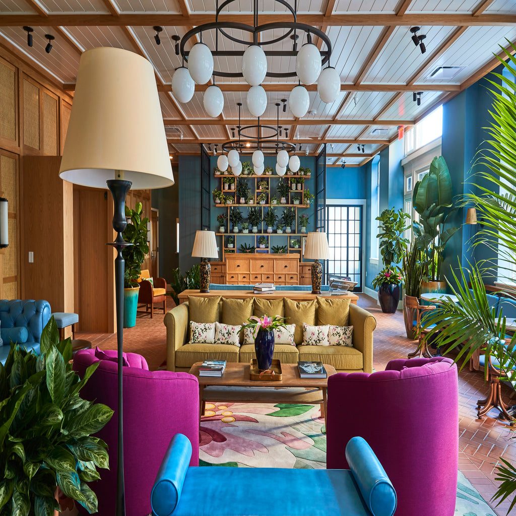 The The Drayton Hotel Savannah, Curio Collection by Hilton lobby with jewel-toned furniture.